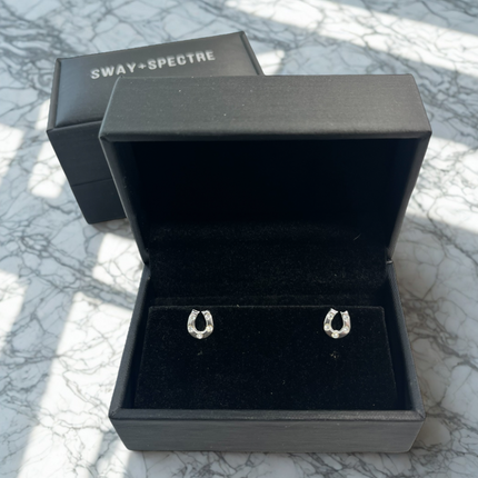 925 sterling silver studs • horseshoe