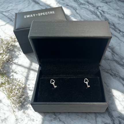 925 sterling silver studs • key