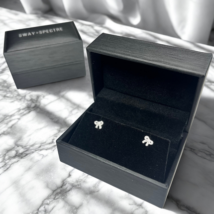 925 sterling silver studs • bow