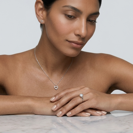 Sterling Silver Earrings • Cubic Zirconia Open Heart Studs